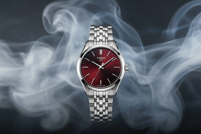 tissot red dail with sliver chain strap smokey air background